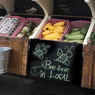 photo: bins with veggies on Farm Truck